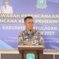 Bupati Aneng menyampaikan sambutan sekaligus membuka secara resmi Musrenbang RKPD Kabupaten Kepulauan Anambas Tahun 2027 di Aula Prof. M. Zen Lantai III Kantor Bupati, Kamis (26/2/2026).
