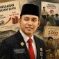 Karikatur editorial Kepala Dinas Koperasi dan UKM Provinsi Kepulauan Riau, Riki Rionaldi, dengan latar kegiatan pemberdayaan UMKM dan pelatihan SDM Koperasi Desa/Kelurahan Merah Putih terkait pelaksanaan program DAK Nonfisik Tahun 2025. (Ilustrasi/Gennews.id)